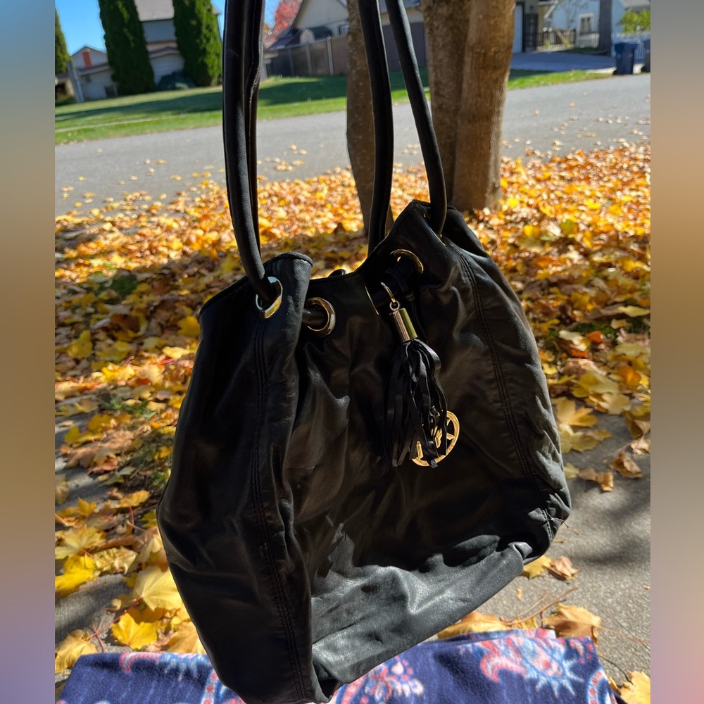 Michael Kors Black Leather Purse w/ Tassle and large MK gold logo